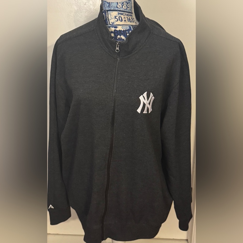 Used- New York Yankees Antigua 
Full zip light sweater/jacket 
Charcoal
XL
